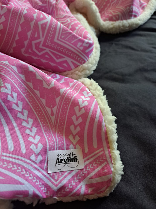 Piniki Throw Blanket